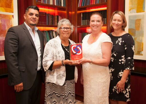Dr Leanne Coombe (second from right) receiving the BHERT Award with IUIH CEO Adrian Carson (left), IUIH Chairperson Lynette Shipway (second from left) and IUIH Director of Allied Health & Workforce Development Dr Alison Nelson (right).