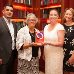 Dr Leanne Coombe (second from right) receiving the BHERT Award with IUIH CEO Adrian Carson (left), IUIH Chairperson Lynette Shipway (second from left) and IUIH Director of Allied Health & Workforce Development Dr Alison Nelson (right).