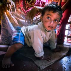 Toddler crawling on floor